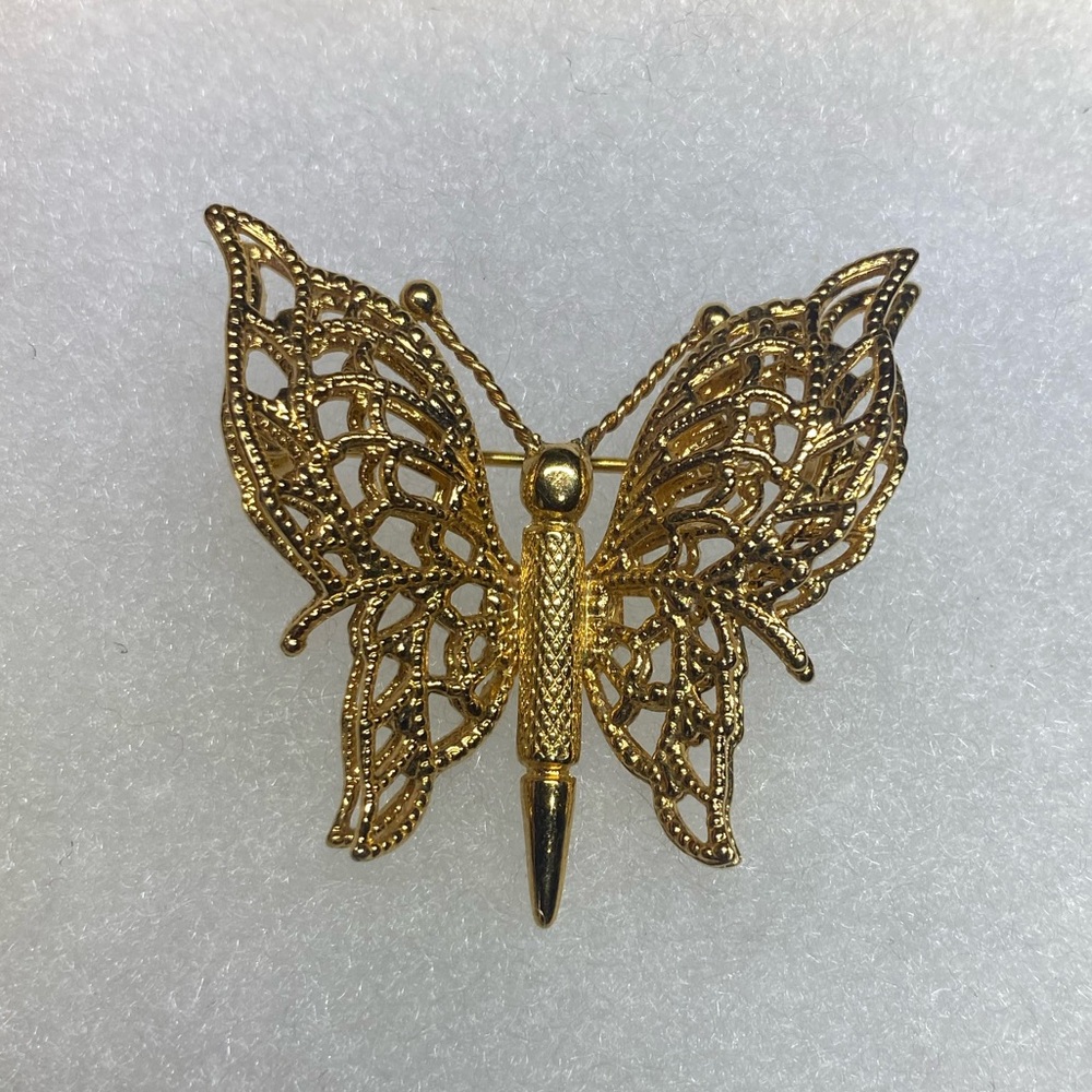 Vintage Monet gold tone filigree butterfly brooch